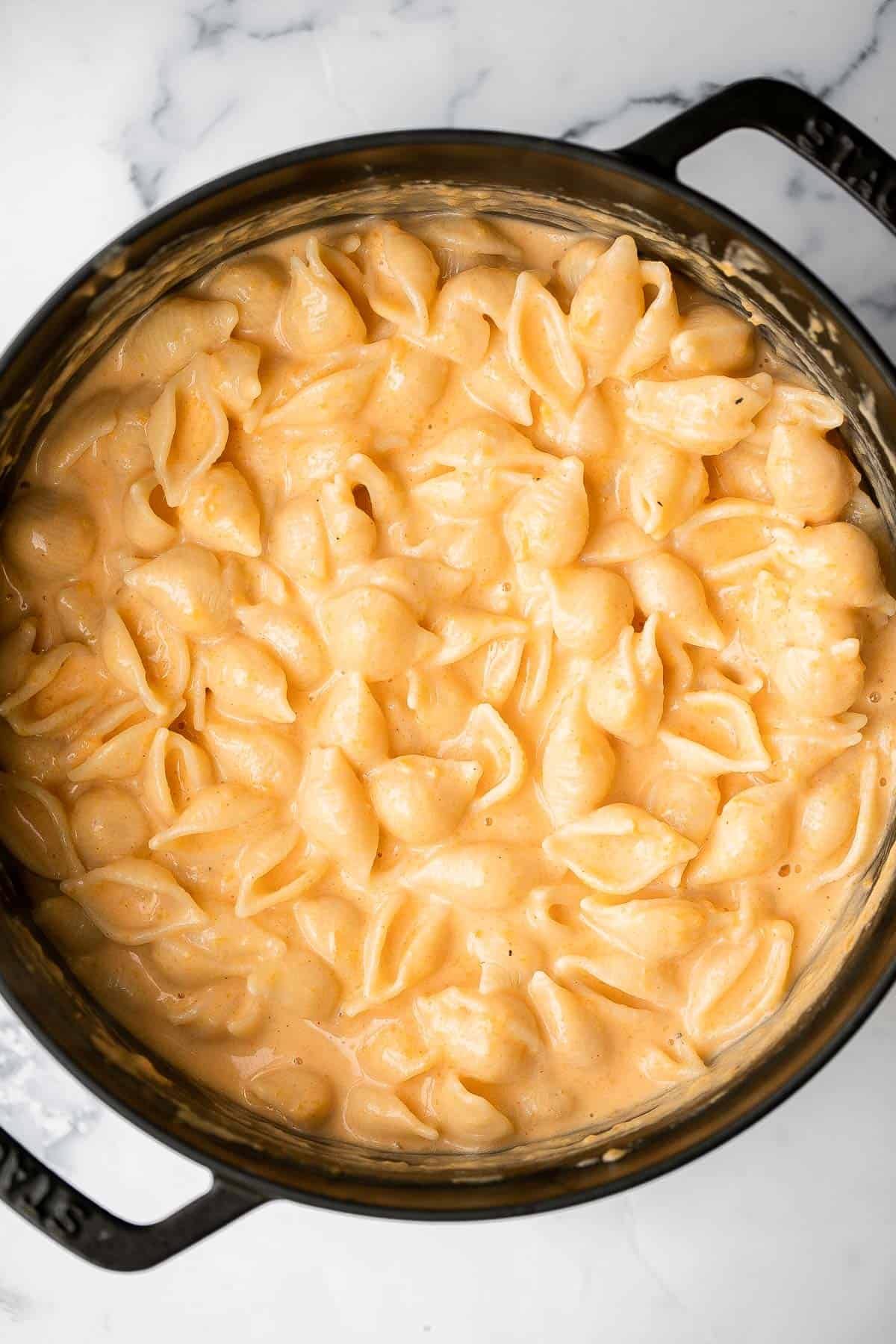 Butternut squash mac and cheese is a flavorful and delicious fall twist on a classic, with a rich and creamy sauce that is secretly loaded with veggies. | aheadofthyme.com