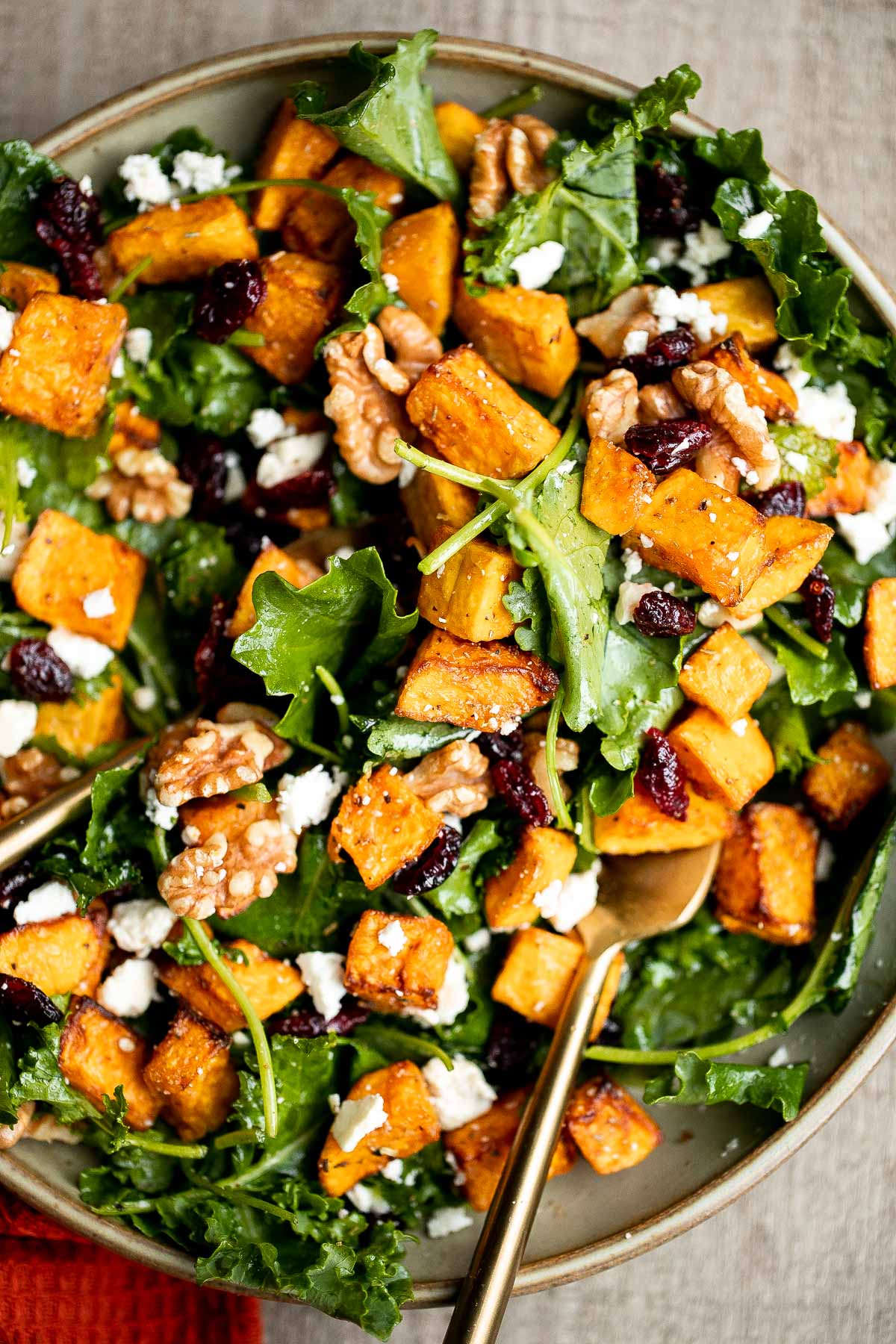 Butternut squash salad is a light meal that's loaded with fall flavors — roasted butternut squash, baby kale, walnuts, dried cranberries, and feta. | aheadofthyme.com