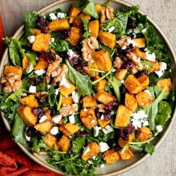 Butternut squash salad is a light meal that's loaded with fall flavors — roasted butternut squash, baby kale, walnuts, dried cranberries, and feta. | aheadofthyme.com