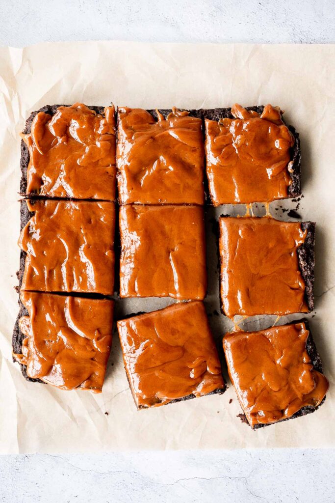 Caramel brownies are rich, moist, and decadent. Baked from the thickest and indulgent chocolate batter and topped with a homemade creamy caramel sauce. | aheadofthyme.com