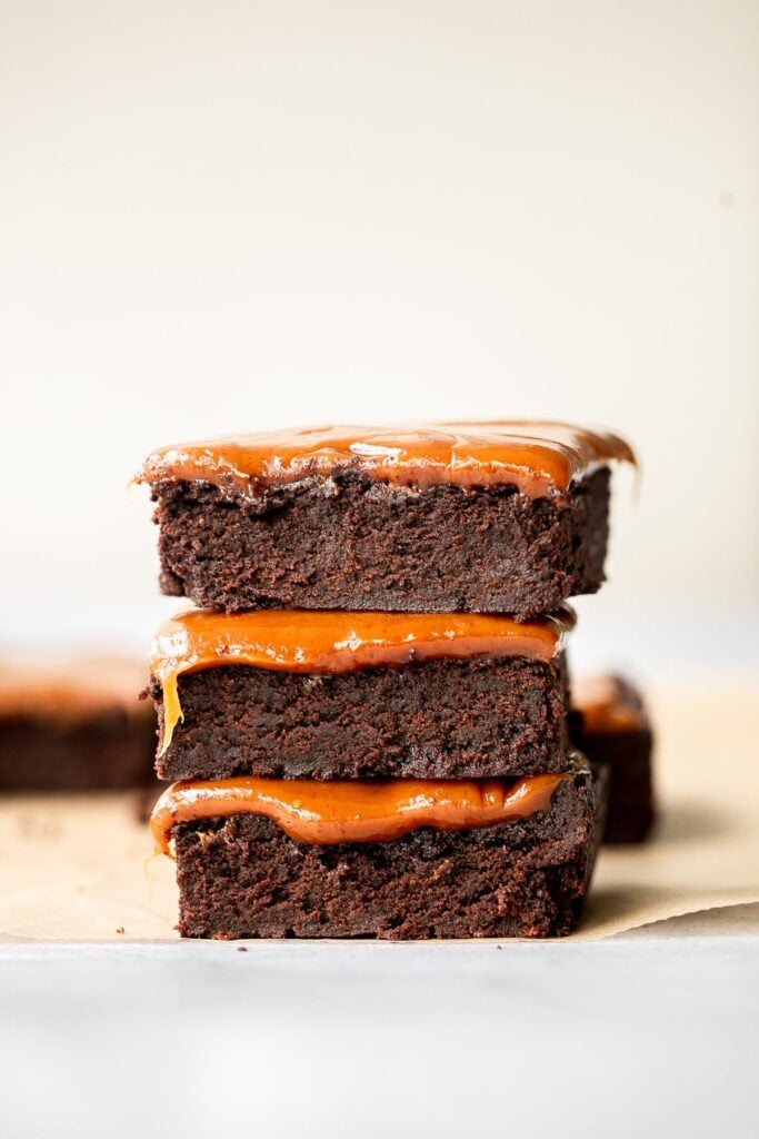 Caramel brownies are rich, moist, and decadent. Baked from the thickest and indulgent chocolate batter and topped with a homemade creamy caramel sauce. | aheadofthyme.com