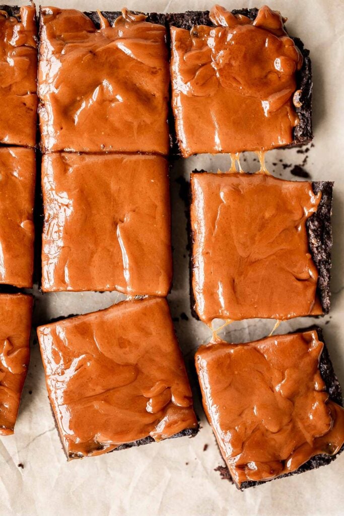 Caramel brownies are rich, moist, and decadent. Baked from the thickest and indulgent chocolate batter and topped with a homemade creamy caramel sauce. | aheadofthyme.com