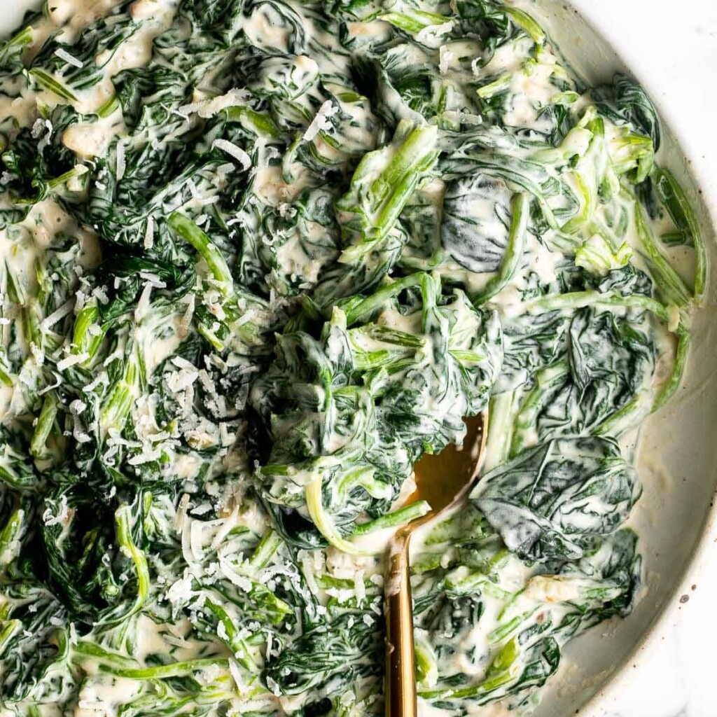 Indulge in this rich and creamy steakhouse-style creamed spinach recipe. An easy, decadent side dish for any meal or special occasion. | aheadofthyme.com