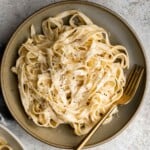 Fettuccine alfredo is a classic Italian pasta dish that is rich, creamy, and delicious. Plus, it comes together in less than 15 minutes! | aheadofthyme.com