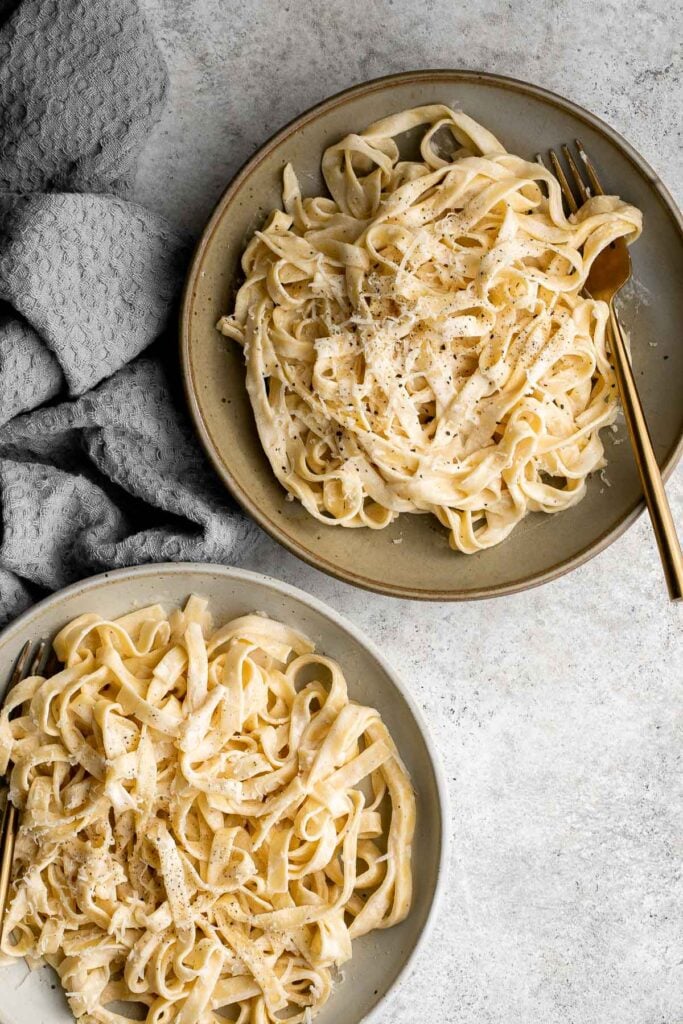 Fettuccine alfredo is a classic Italian pasta dish that is rich, creamy, and delicious. Plus, it comes together in less than 15 minutes! | aheadofthyme.com