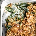 Green bean casserole is a classic holiday side dish packed with fresh green beans in a delicious creamy mushroom sauce, and topped with crispy fried onions. | aheadofthyme.com