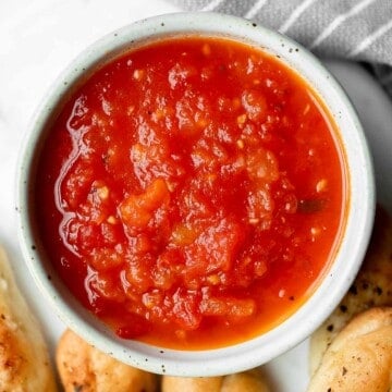 Marinara sauce is rich, vibrant, and loaded with flavor. It’s easy to make with a few simple fresh ingredients. Serve as a dip or in pasta and pizza. | aheadofthyme.com