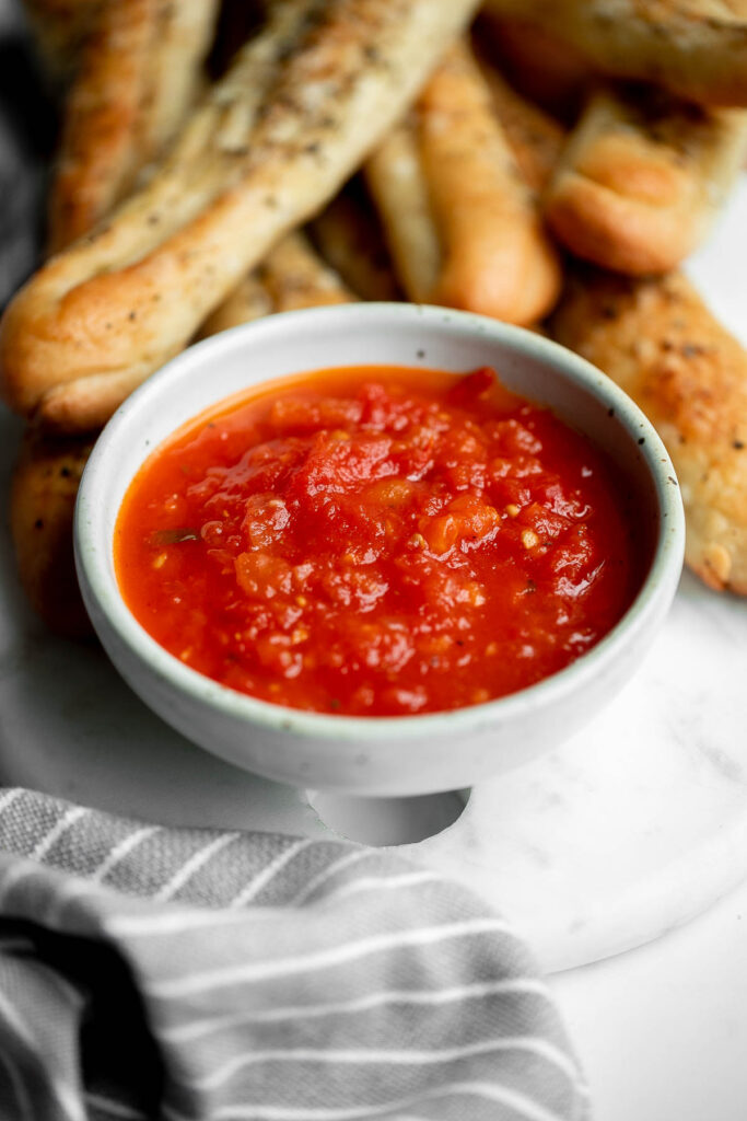 Marinara sauce is rich, vibrant, and loaded with flavor. It’s easy to make with a few simple fresh ingredients. Serve as a dip or in pasta and pizza. | aheadofthyme.com