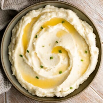 Mascarpone mashed potatoes are creamy, smooth, and comforting. Classic mashed potatoes are given a twist resulting in a super silky and rich mash. | aheadofthyme.com