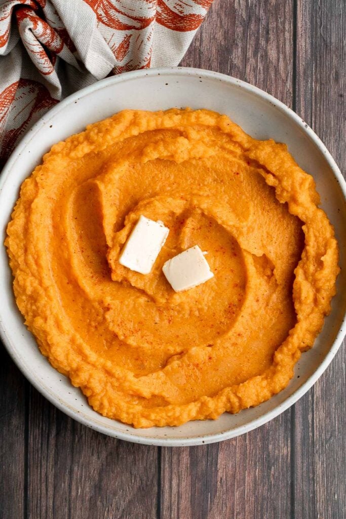 Mashed butternut squash is the perfect side dish for fall — creamy, smooth, and delicious, with the perfect balance between sweet and savory fall flavors. | aheadofthyme.com