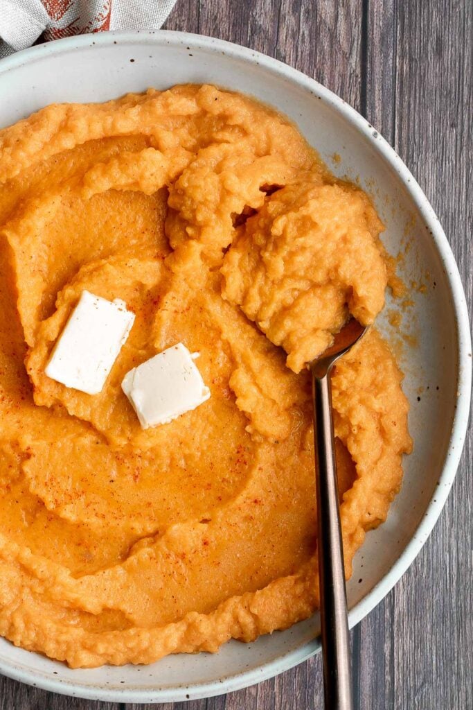 Mashed butternut squash is the perfect side dish for fall — creamy, smooth, and delicious, with the perfect balance between sweet and savory fall flavors. | aheadofthyme.com