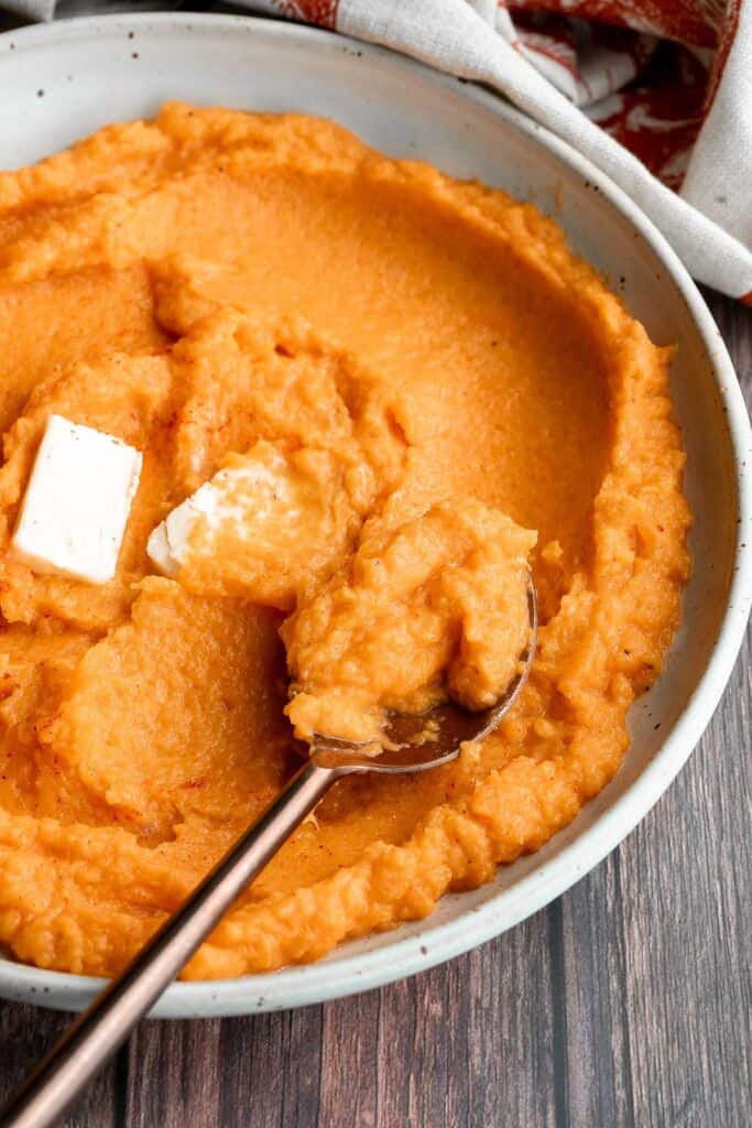 Mashed butternut squash is the perfect side dish for fall — creamy, smooth, and delicious, with the perfect balance between sweet and savory fall flavors. | aheadofthyme.com