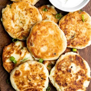 Mashed potato cakes are light and fluffy inside, crispy golden outside, and so delicious and flavorful. The best way to use up leftover mashed potatoes! | aheadofthyme.com