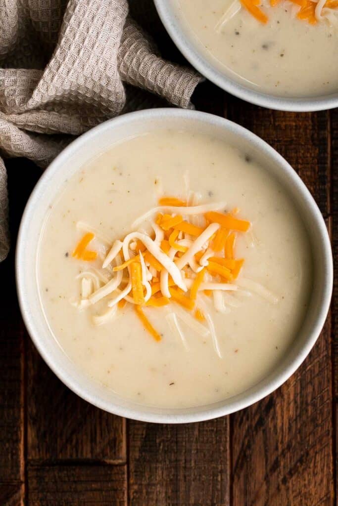 Mashed potato soup is one of the best ways to use up leftover mashed potatoes. It’s creamy, cheesy, delicious, and ready in under 30 minutes. | aheadofthyme.com