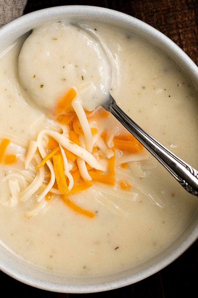 Mashed potato soup is one of the best ways to use up leftover mashed potatoes. It’s creamy, cheesy, delicious, and ready in under 30 minutes. | aheadofthyme.com