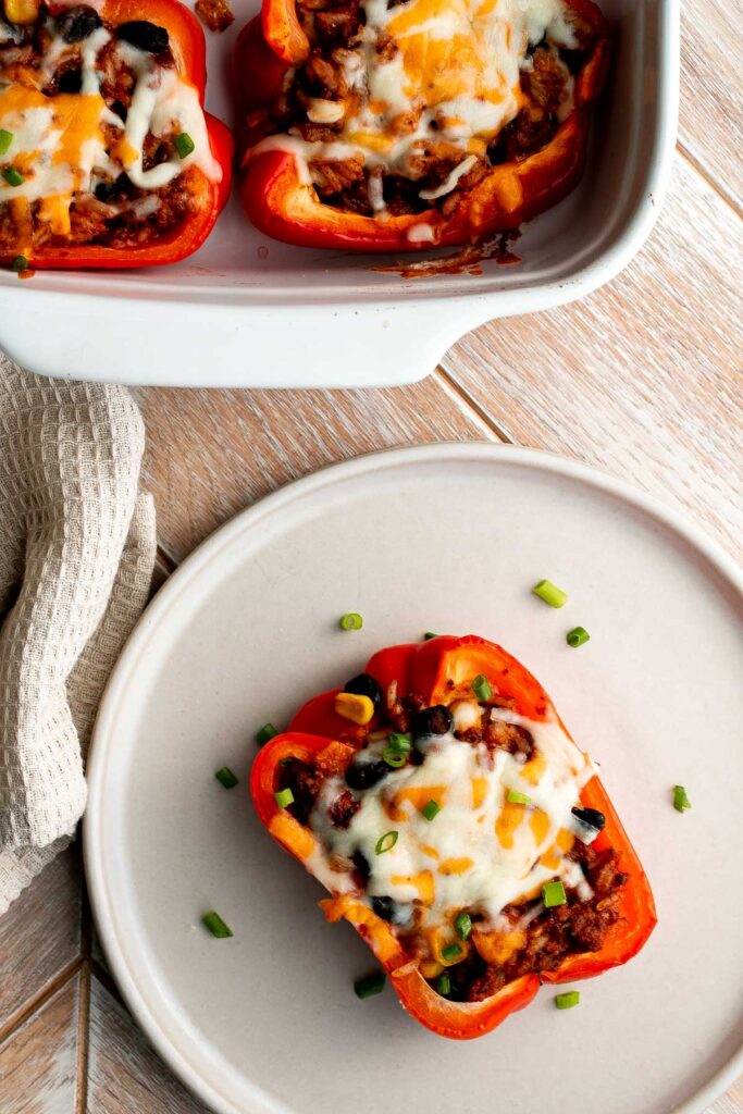 Mexican stuffed peppers are a delicious, wholesome, healthy meal loaded with fun Mexican flavors. It freezes well and is perfect for meal prep. | aheadofthyme.com