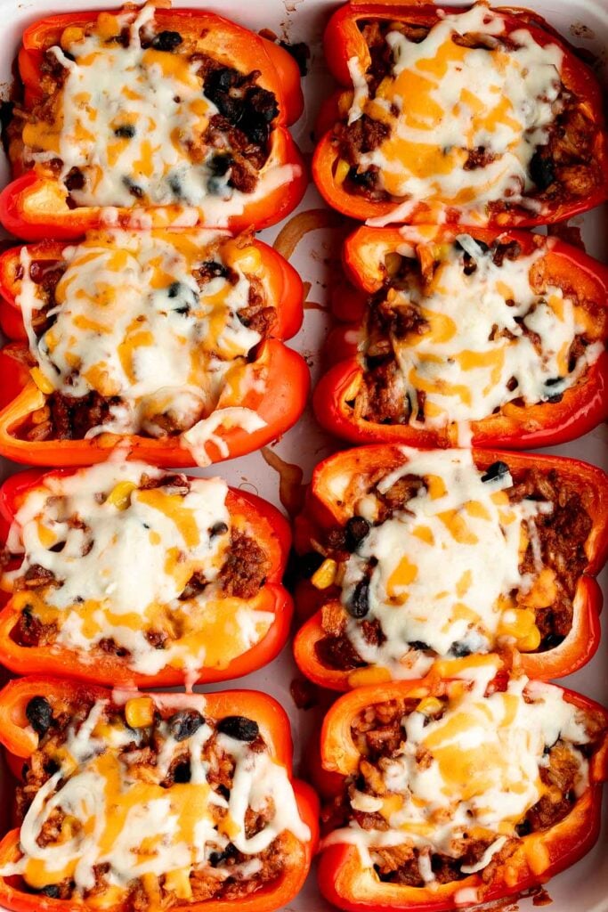 Mexican stuffed peppers are a delicious, wholesome, healthy meal loaded with fun Mexican flavors. It freezes well and is perfect for meal prep. | aheadofthyme.com