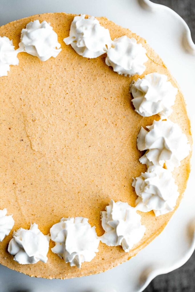 No bake pumpkin cheesecake is the easiest cheesecake to make this fall. It's light, smooth, creamy, and loaded with fall flavors like pumpkin and cinnamon. | aheadofthyme.com