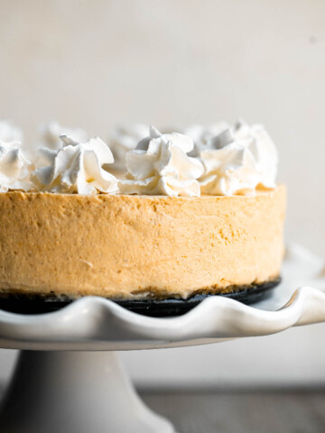 No bake pumpkin cheesecake is the easiest cheesecake to make this fall. It's light, smooth, creamy, and loaded with fall flavors like pumpkin and cinnamon. | aheadofthyme.com