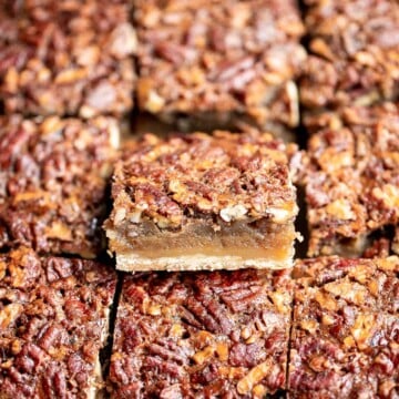 Pecan pie bars are the best and easiest way to enjoy the flavors of pecan pie but with half the effort and in a handheld bite-sized form. | aheadofthyme.com