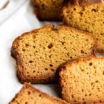 Pumpkin bread is fluffy, moist, and delicious. This classic fall loaf cake is loaded with real pumpkin and seasonal spices like cinnamon and ginger. | aheadofthyme.com