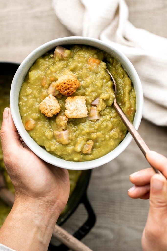 Classic split pea soup is a wholesome, filling, and delicious one pot meal that will warm you up. It's hearty, flavorful, and is loaded with nutrients. | aheadofthyme.com