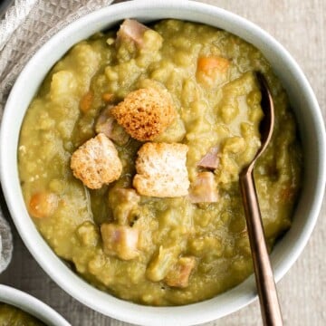 Classic split pea soup is a wholesome, filling, and delicious one pot meal that will warm you up. It's hearty, flavorful, and is loaded with nutrients. | aheadofthyme.com