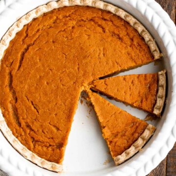 Sweet potato pie is warm and cozy, spiced with classic fall flavors, and delicious. Easy to make with cooked sweet potatoes or canned sweet potato puree. | aheadofthyme.com