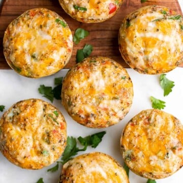 Tex Mex egg muffins are a delicious, filling, and healthy breakfast or snack. They are light and fluffy, perfect for meal prep, and freezer-friendly. | aheadofthyme.com