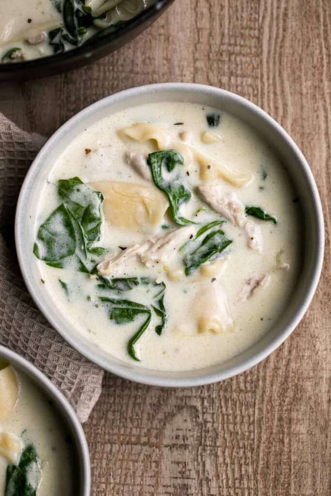 White chicken lasagna soup is a thick and creamy soup version of this classic Italian dish. It’s quick and easy to make in just 30 minutes. | aheadofthyme.com