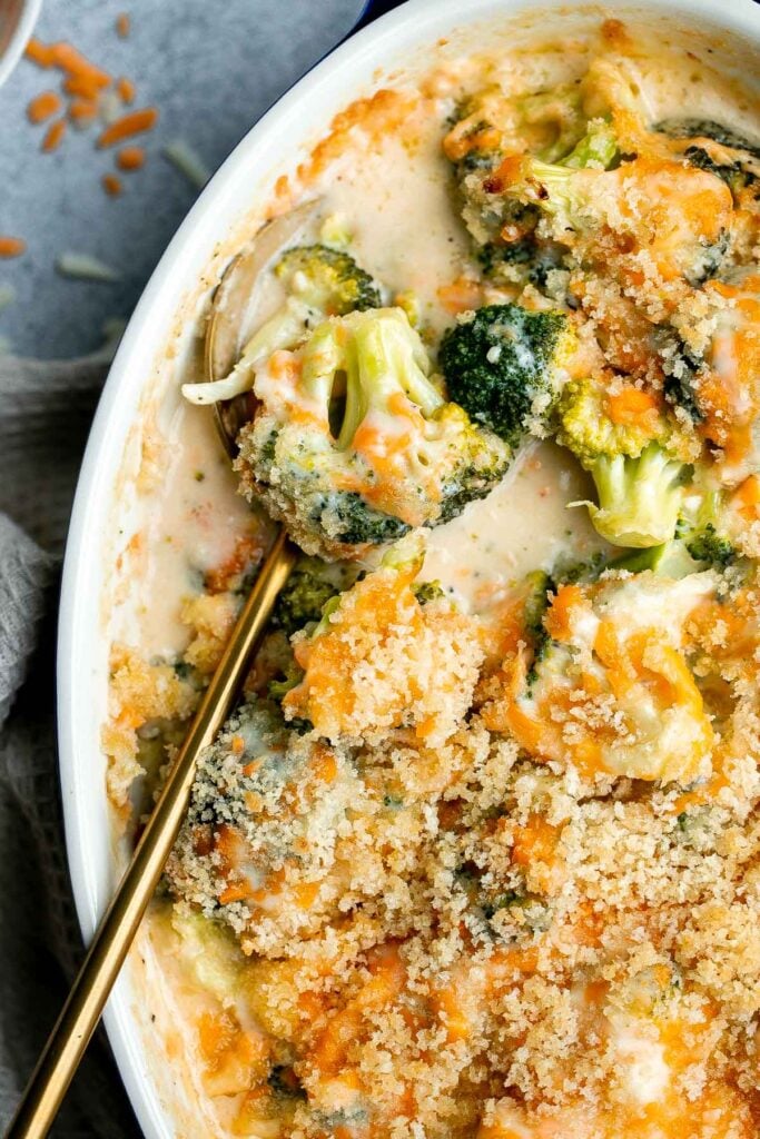 Broccoli cheese casserole is creamy, cheesy, and delicious — the most comforting side dish. It’s crispy on the outside but soft and tender inside. | aheadofthyme.com
