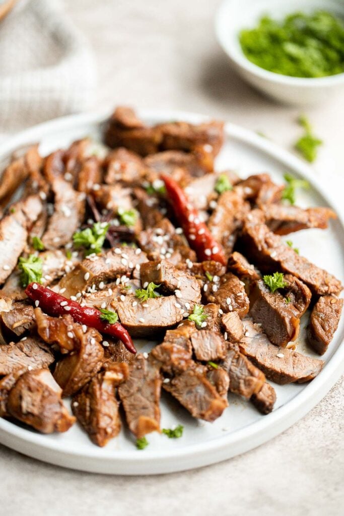 Chinese braised veal shank is juicy, tender, spicy, and sweet. It's an easy one pot recipe that takes very little effort to make with just 5 minutes prep. | aheadofthyme.com