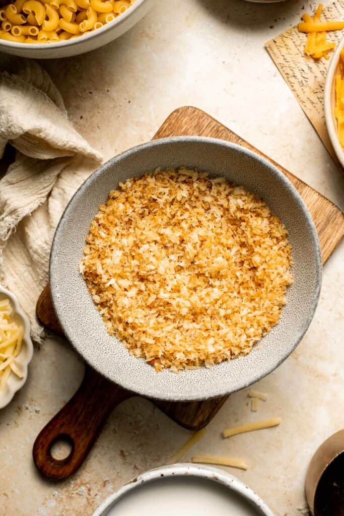 Classic Baked Mac and Cheese is creamy, cheesy, and topped with golden garlic breadcrumbs. The ultimate comfort food, ready in under an hour. | aheadofthyme.com