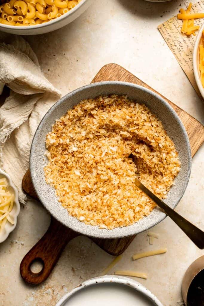 Classic Baked Mac and Cheese is creamy, cheesy, and topped with golden garlic breadcrumbs. The ultimate comfort food, ready in under an hour. | aheadofthyme.com