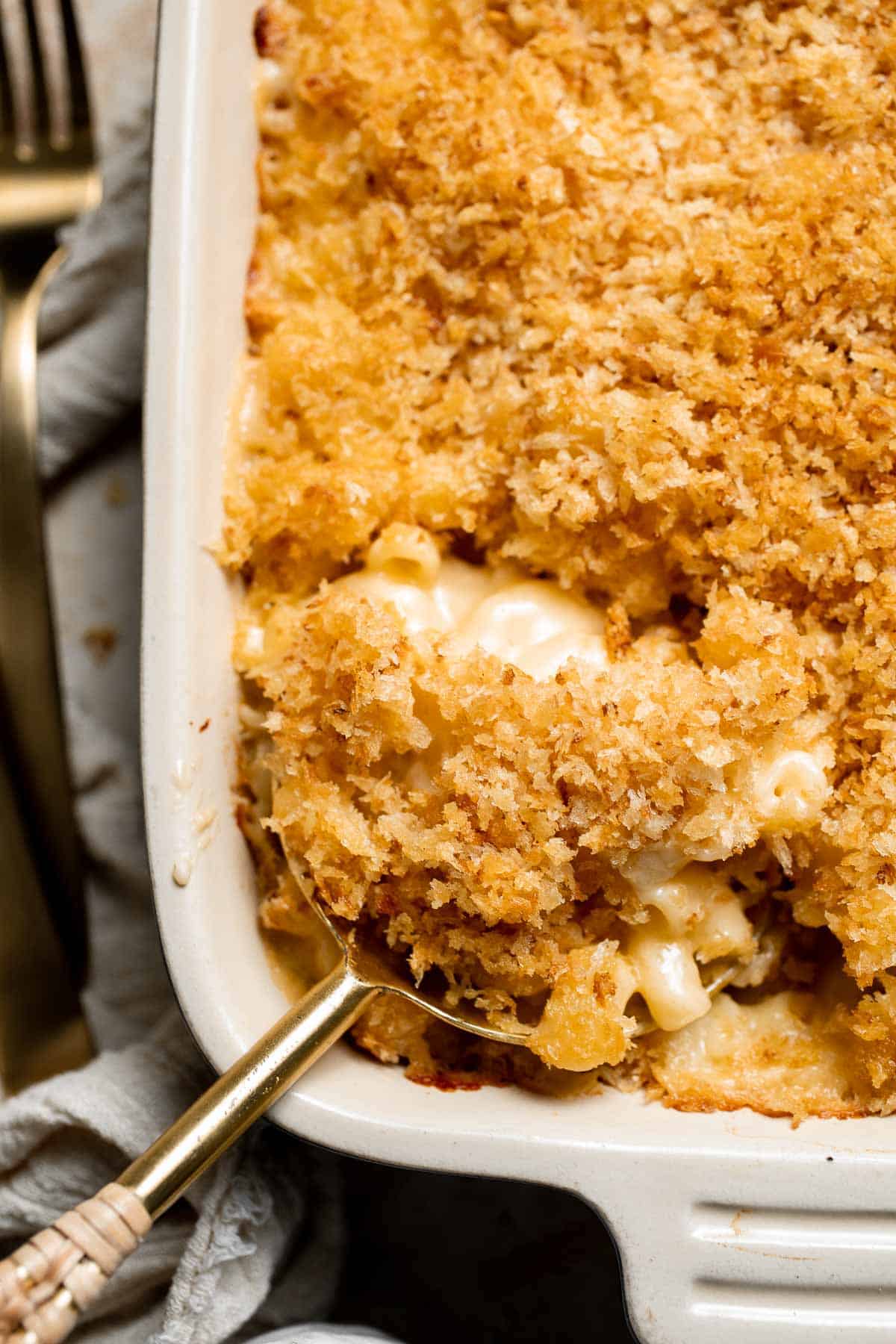 Classic Baked Mac and Cheese is creamy, cheesy, and topped with golden garlic breadcrumbs. The ultimate comfort food, ready in under an hour. | aheadofthyme.com