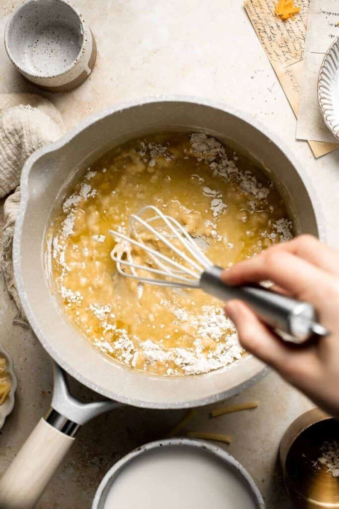Classic Baked Mac and Cheese is creamy, cheesy, and topped with golden garlic breadcrumbs. The ultimate comfort food, ready in under an hour. | aheadofthyme.com