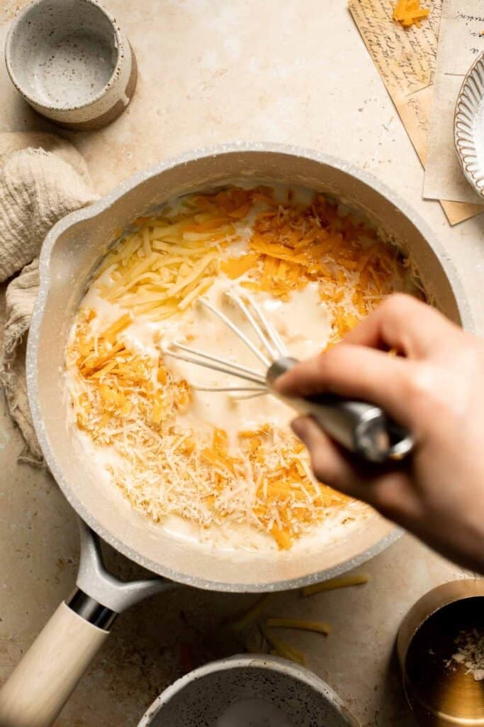 Classic Baked Mac and Cheese is creamy, cheesy, and topped with golden garlic breadcrumbs. The ultimate comfort food, ready in under an hour. | aheadofthyme.com