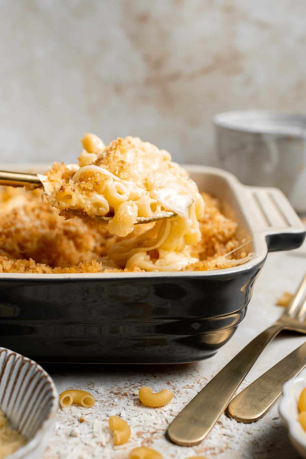Classic Baked Mac and Cheese is creamy, cheesy, and topped with golden garlic breadcrumbs. The ultimate comfort food, ready in under an hour. | aheadofthyme.com