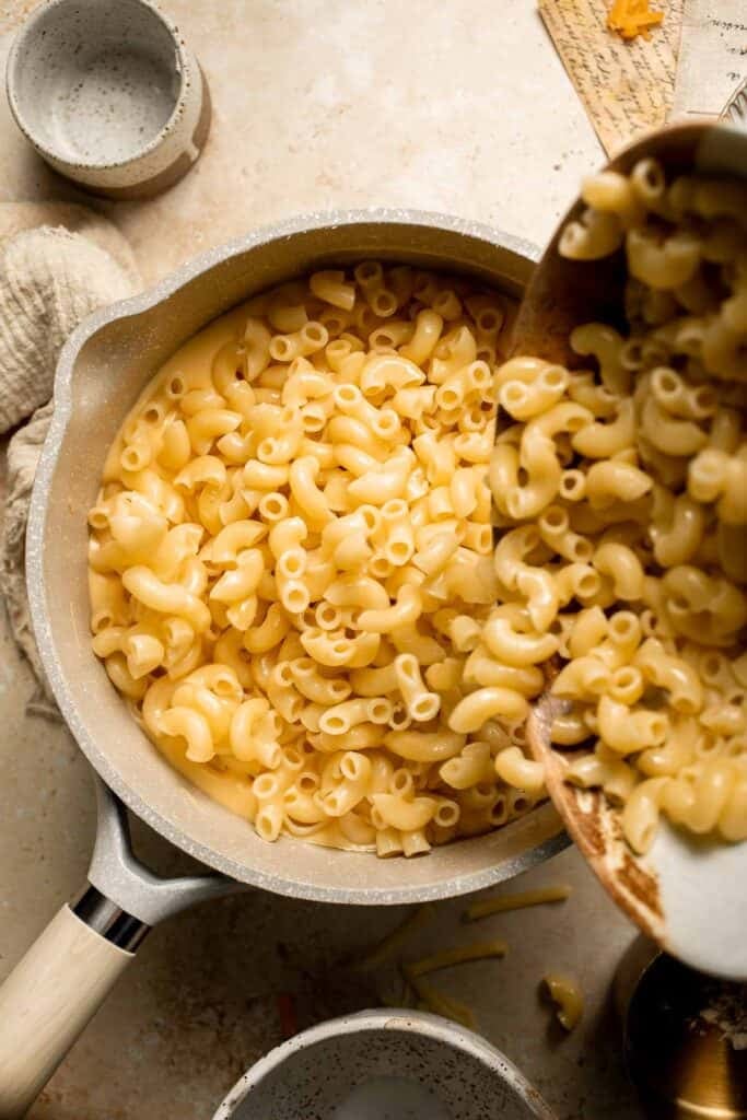 Classic Baked Mac and Cheese is creamy, cheesy, and topped with golden garlic breadcrumbs. The ultimate comfort food, ready in under an hour. | aheadofthyme.com