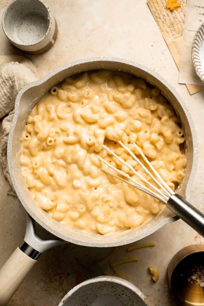 Classic Baked Mac and Cheese is creamy, cheesy, and topped with golden garlic breadcrumbs. The ultimate comfort food, ready in under an hour. | aheadofthyme.com