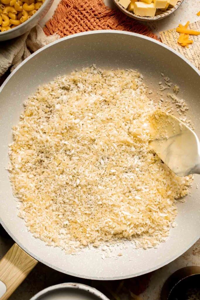 Classic Baked Mac and Cheese is creamy, cheesy, and topped with golden garlic breadcrumbs. The ultimate comfort food, ready in under an hour. | aheadofthyme.com