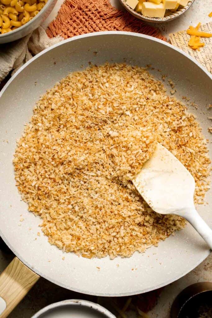 Classic Baked Mac and Cheese is creamy, cheesy, and topped with golden garlic breadcrumbs. The ultimate comfort food, ready in under an hour. | aheadofthyme.com