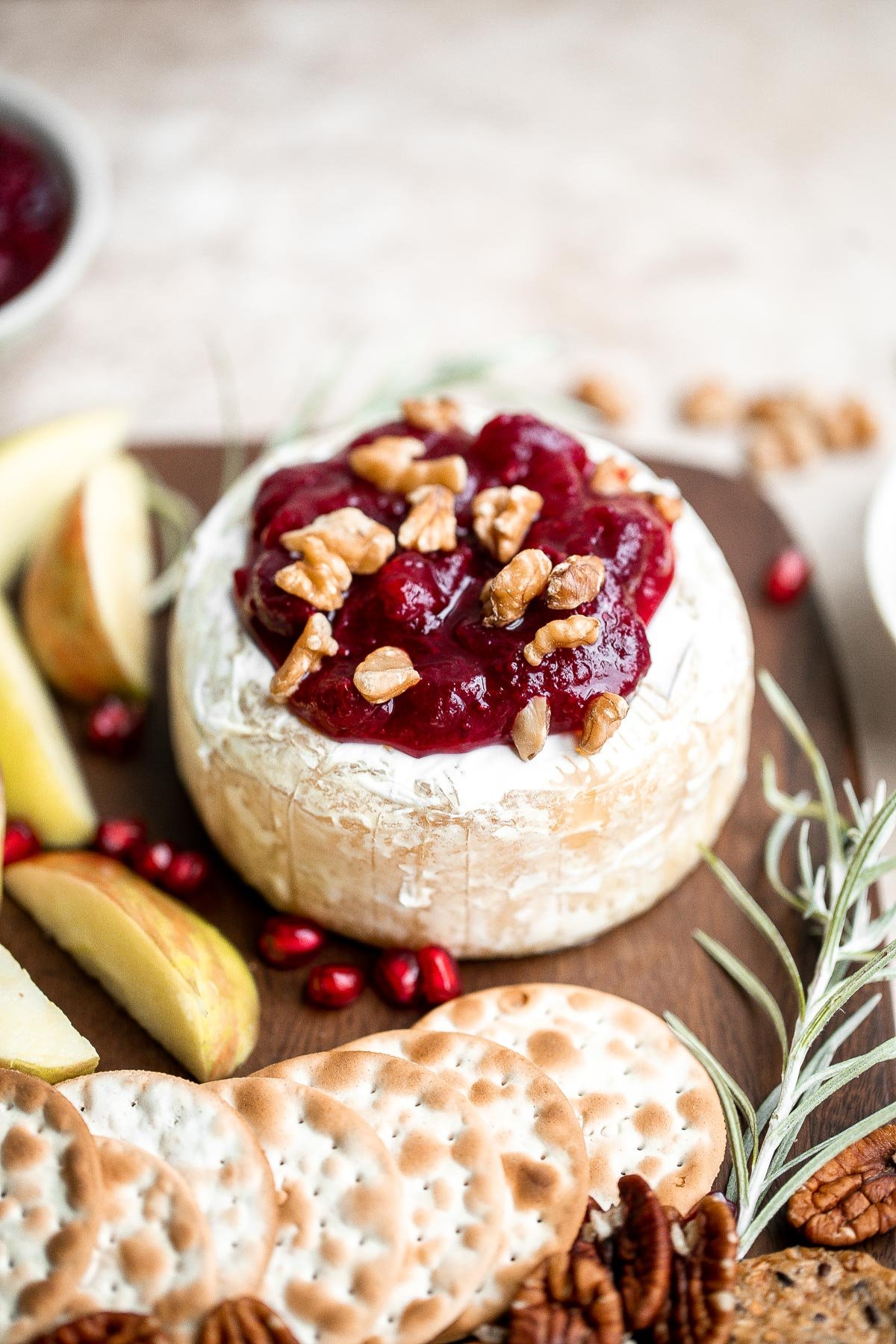 Cranberry baked brie is a sweet and savory appetizer you need to try this holiday season. It's quick and easy, melty and gooey, and so delicious. | aheadofthyme.com