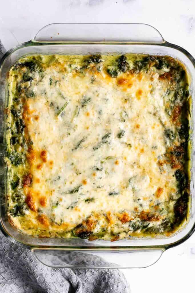 Creamed Spinach Gratin is a rich, cheesy, and creamy side dish with a layer of crispy, melty cheese on top. Easy to make ahead and perfect for holidays. | aheadofthyme.com