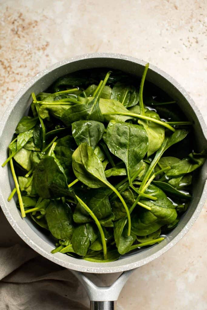 Creamed Spinach Gratin is a rich, cheesy, and creamy side dish with a layer of crispy, melty cheese on top. Easy to make ahead and perfect for holidays. | aheadofthyme.com