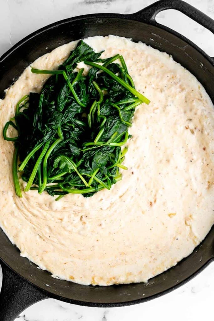 Creamed Spinach Gratin is a rich, cheesy, and creamy side dish with a layer of crispy, melty cheese on top. Easy to make ahead and perfect for holidays. | aheadofthyme.com