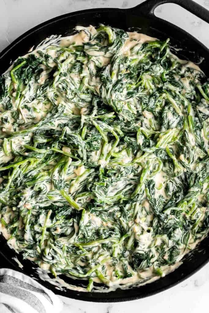 Creamed Spinach Gratin is a rich, cheesy, and creamy side dish with a layer of crispy, melty cheese on top. Easy to make ahead and perfect for holidays. | aheadofthyme.com