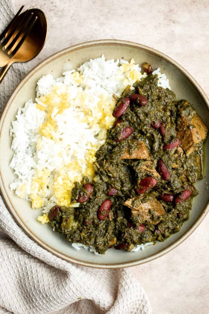 Ghormeh sabzi is a classic traditional Persian herb stew with beef or lamb, fresh herbs, and kidney beans, that's slowly cooked, developing so much flavor. | aheadofthyme.com