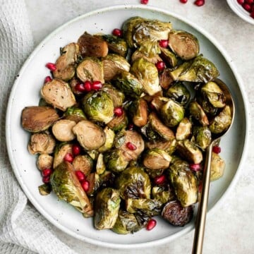 Easy honey balsamic Brussels sprouts are a sweet savory side dish that's roasted until tender and caramelized, and coated in a delicious flavourful glaze. | aheadofthyme.com