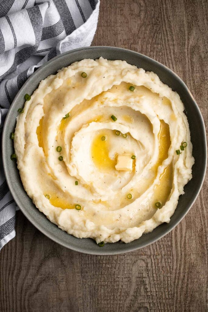 Instant pot mashed potatoes are the quickest and easiest mashed potatoes you’ll make in under 20 minutes (including prep!) in the pressure cooker. | aheadofthyme.com